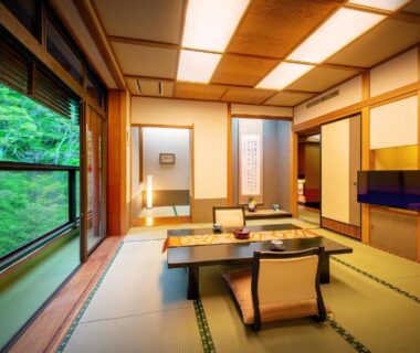 Tatami room with low table and large window overlooking greenery, Konjakutei, Fukushima, Tōhoku
