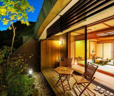 Wooden terrace with chairs opening to tatami room at Konjakutei in Fukushima Tōhoku