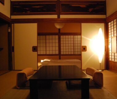 Traditional tatami room with low table, floor cushions and shoji screens at Kotsubokaigan Linca, Kanagawa