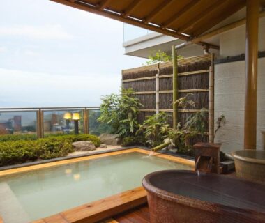 Covered outdoor wooden onsen bath with sea view at Kounkaku, Fukushima, Tōhoku, Japan