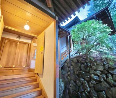 Wooden entrance steps and stone wall at Koyasan Sanadabo Rengejoin, Wakayama, Kansai