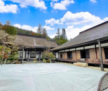 Raked gravel courtyard at Koyasan Sanadabo Rengejoin with traditional wooden buildings in Wakayama, Kansai
