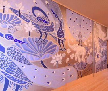 Tatami room with large blue peacock mural and shoji screen at Koyasan Shukubo Saizenin, Wakayama