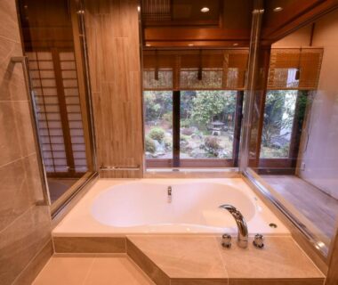 Bathtub overlooking enclosed garden through shoji at Koyasan Shukubo Yochiin, Wakayama
