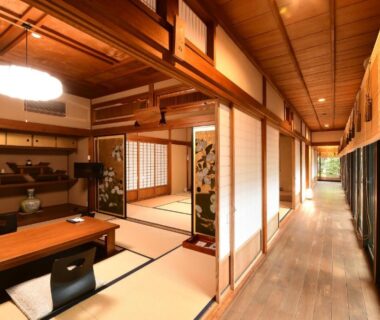 Wooden corridor beside tatami room with shoji screens and low table, Koyasan Shukubo Yochiin, Wakayama