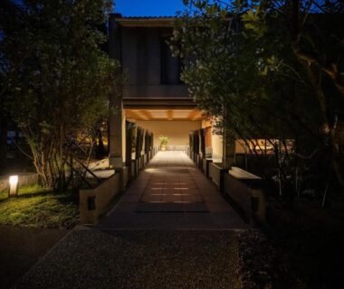 Lantern-lit entrance walkway at Kuriya Yasohachi in Chūbu, Ishikawa, Japan