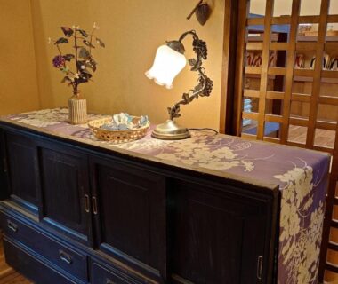 Wooden sideboard with lamp and vase at Kurokawa Onsen Ryokan Ichinoi, Kumamoto Kyushu
