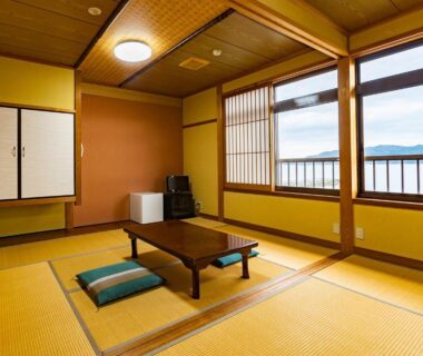 Traditional tatami room with low table and shoji window at Kurosakisou in Kyoto, Kansai, Japan