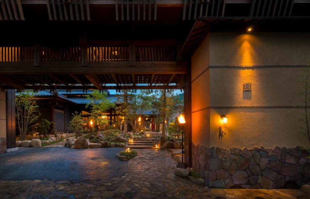 Entrance Courtyard at Kurotake Ryokan Nagano Evening entrance courtyard with lanterns and stone path at Kurotake in Nagano