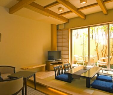 Tatami seating with low table and cushions at Kutsurogi-no-Yado Nanakawa, Ōita, Kyūshū