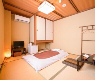 Tatami room with futon, shoji screen and low table at Kyo no Yado Sangen Ninenzaka, Kyoto, Kansai