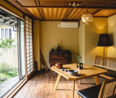 Low wooden seating with shoji doors opening to small garden at Kyo no Yado Sangen Ninenzaka Kyoto