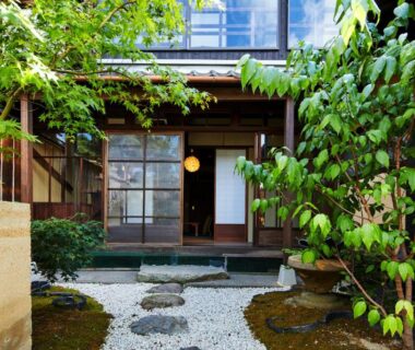 Stepping stone garden path leading to Kyomachiya Hotel Mifuku entrance in Kyoto, Kansai, Japan