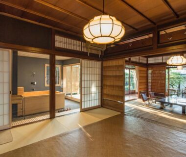 Traditional tatami room with shoji screens, low table and garden view at Nanzenji Ryokan Yachiyo, Kyoto