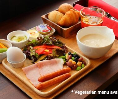 Wooden breakfast tray with eggs, ham, salad at Kyoto Takasegawa Bettei, Kyoto