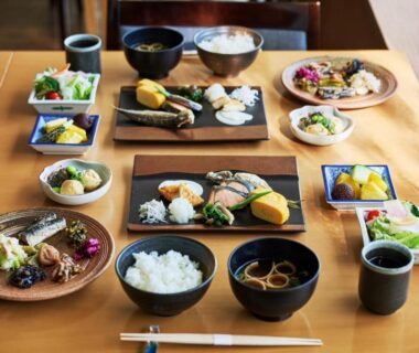Assorted Japanese meal on wooden table at Laforet Hakone Gora Yunosumika, Kanagawa, Japan