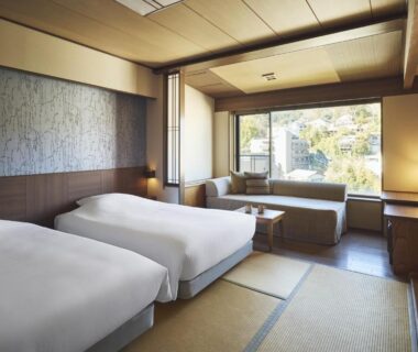 Tatami room with twin beds and garden view at Laforet Ito Onsen Yunoniwa in Shizuoka, Chūbu, Japan