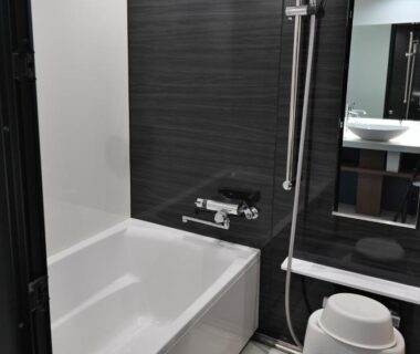 Modern bathroom with bathtub and shower at Lake Saroma Tsuruga Resort Hokkaidō