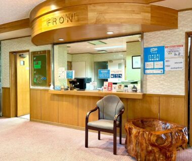 Wooden reception counter and seating in Lake Side Nikko Hotel lobby, Tochigi, Kantō