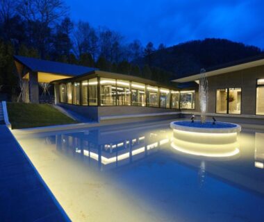 Illuminated reflecting pool at Lake Toya Tsuruga Resort HIKARINOUTA in Hokkaidō, Japan at dusk