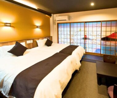 Room with twin beds and shoji screens at LiVEMAX RESORT Hakone Sengokuhara, Kanagawa, Japan