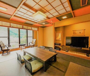 Tatami room with low table and shoji windows at LiVEMAX RESORT Kawaji, Tochigi