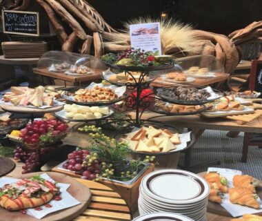 Assorted pastries, cheeses and fruit on buffet platters at LiVEMAX RESORT Kinugawa, Tochigi