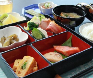 Bento-style breakfast with rice, miso soup, grilled fish and sides at Lodge Clubman in Iwate, Tōhoku