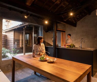 Rustic dining area with long wooden table and open kitchen, Machihaku 456, Shizuoka, Chūbu, Japan