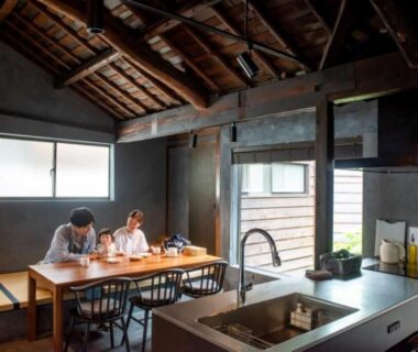 Low table and tatami seating with kitchenette at Machihaku 456 in Shizuoka, Chūbu Japan