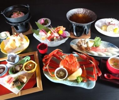 Assorted ryokan dishes with crab centerpiece, sashimi, tempura and small hot pots at Manten no Tsujinoya, Ishikawa