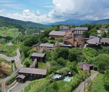 Aerial view of multi building ryokan complex at Manza Onsen Nisshinkan in Gunma, Kantō, Japan