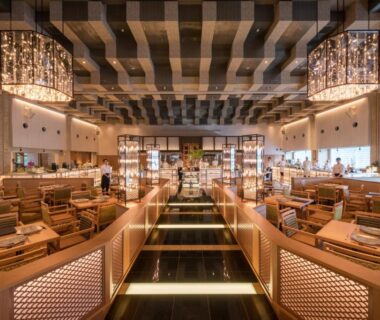 Large wooden dining hall with individual booths and chandeliers at Matsushima Ichinobo, Miyagi Tōhoku