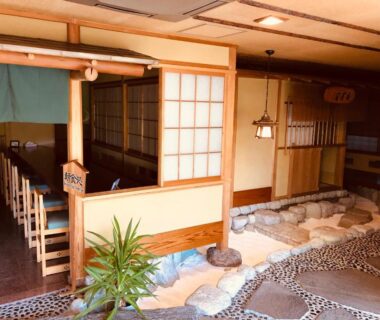 Stone lined indoor bath with shoji screens at Matsushima Koumura in Miyagi Tōhoku Japan