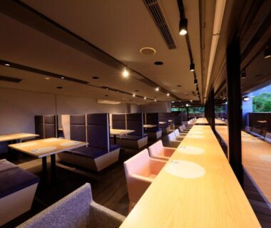 Long wooden counter with stools and booth seating at Merveille Hakone Gora, Kanagawa