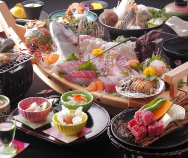 Sashimi, shellfish, grilled meat and small side dishes at Michishio Mie