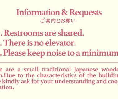 Information sign listing shared restrooms, no elevator, and quiet request at Migumiya Ryokan in Hyōgo Japan