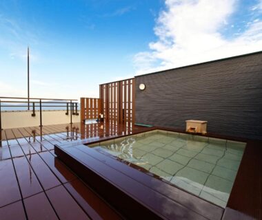 Rooftop onsen with wooden deck and tiled tub at Mimatsukan in Gunma Kanto Japan