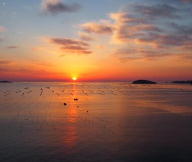 Sunset over calm sea seen from Minami Sanriku Hotel kanyo, Miyagi coast in Tohoku