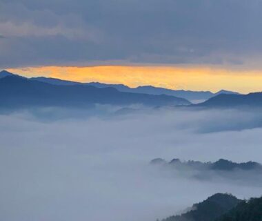Mist-filled valleys and layered mountains at sunrise, view from Minshuku Kawarabi-so in Nara