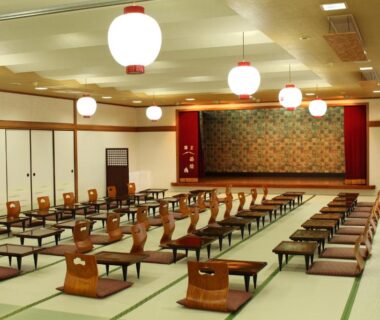 Spacious tatami banquet hall with low tables at Miyajima Seaside Hotel in Hiroshima, Chugoku
