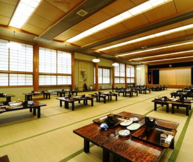 Spacious tatami dining hall with low wooden tables and shoji screens in Miyamaso, Gifu, Chūbu