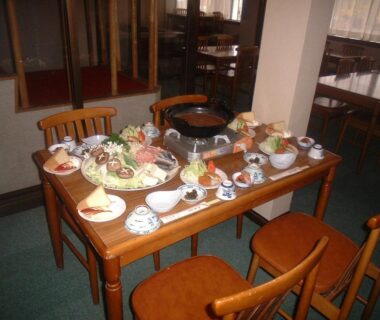 Table with assorted Japanese dishes and hotpot at Mizubaso in Gifu