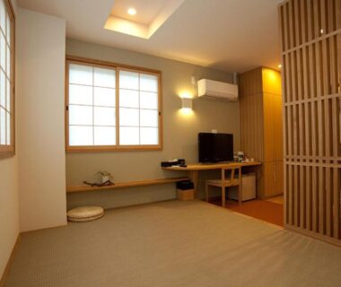 Tatami room at Mizuhasou in Hiroshima with shoji screens and wooden lattice divider