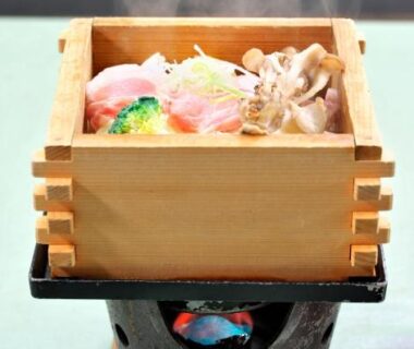 Steaming wooden masu box of assorted ingredients on tabletop burner at Mori no RyoTei, Fukushima, Tōhoku