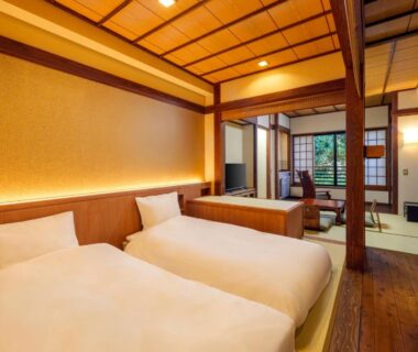 Western twin beds and tatami seating with shoji screens at Mori no yu Kira No Sato Shizuoka
