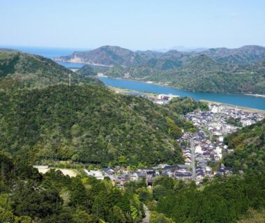 Aerial view of coastal town and bay near Morizuya, Hyōgo in Kansai with forested hills