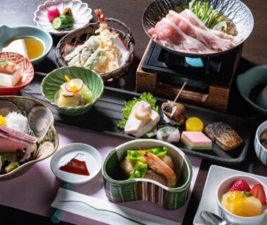 Assortment of small plated Japanese dishes on trays at Mount View Hakone Kanagawa