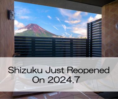 Tiled outdoor bath with slatted fence and Mount Fuji view at Ryokan Shizuku in Yamanashi