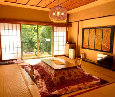 Tatami room featuring kotatsu and shoji screens at Musashino Bekkan, Kanagawa, Kantō